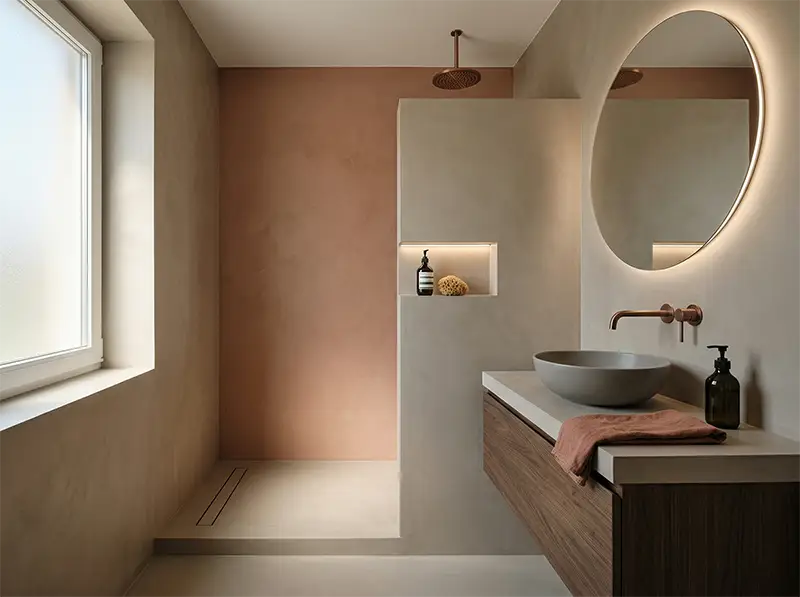 Bagno di lusso con pareti e pavimento in resina continua senza fughe